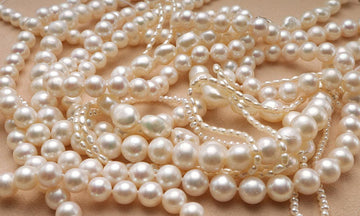 Kinds of types pearl stard on brown leather.