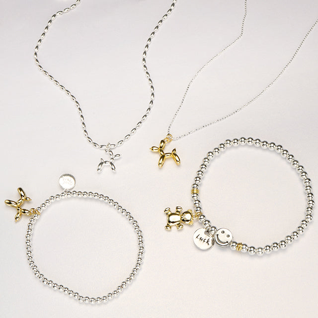 Two types chain balloon dog pendants and two charms beaded adjustable bracelet.