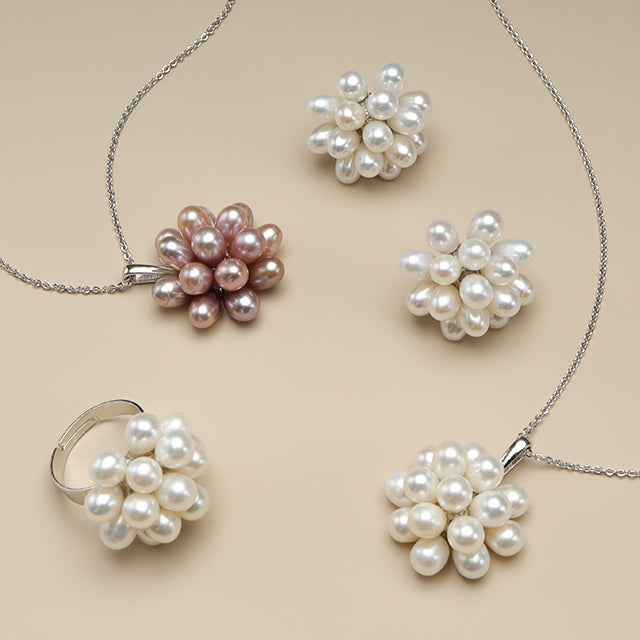 Popcorn pearl pendant, stud earrings and adjustable ring.
