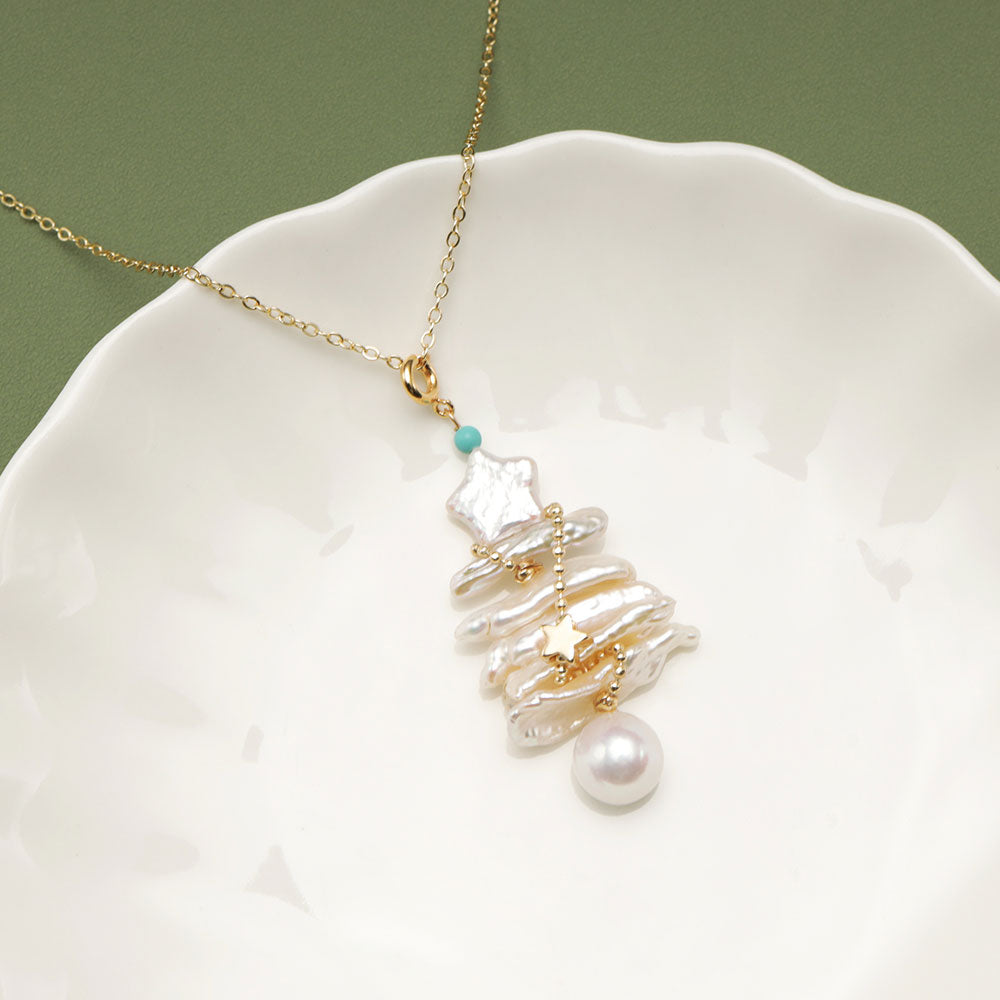 A christmas pearl necklace on a white plate.