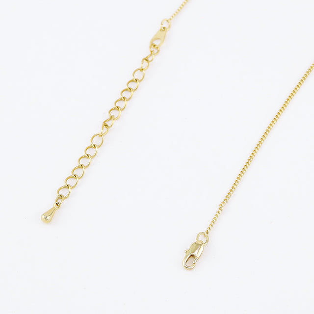 A 18k gold plated neckalce clasp.