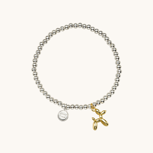A bangle bracelets with charms.