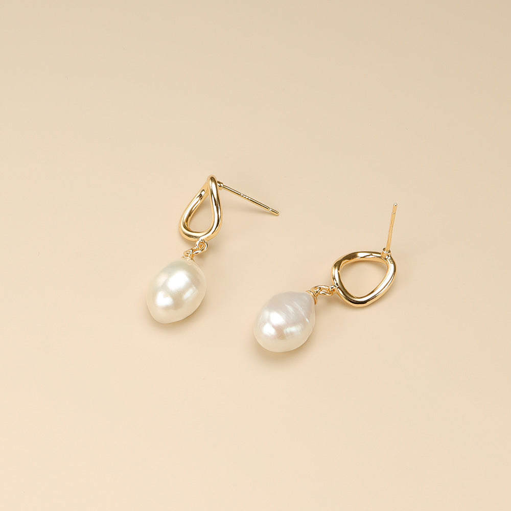 A pair of baroque pearl stud earrings.