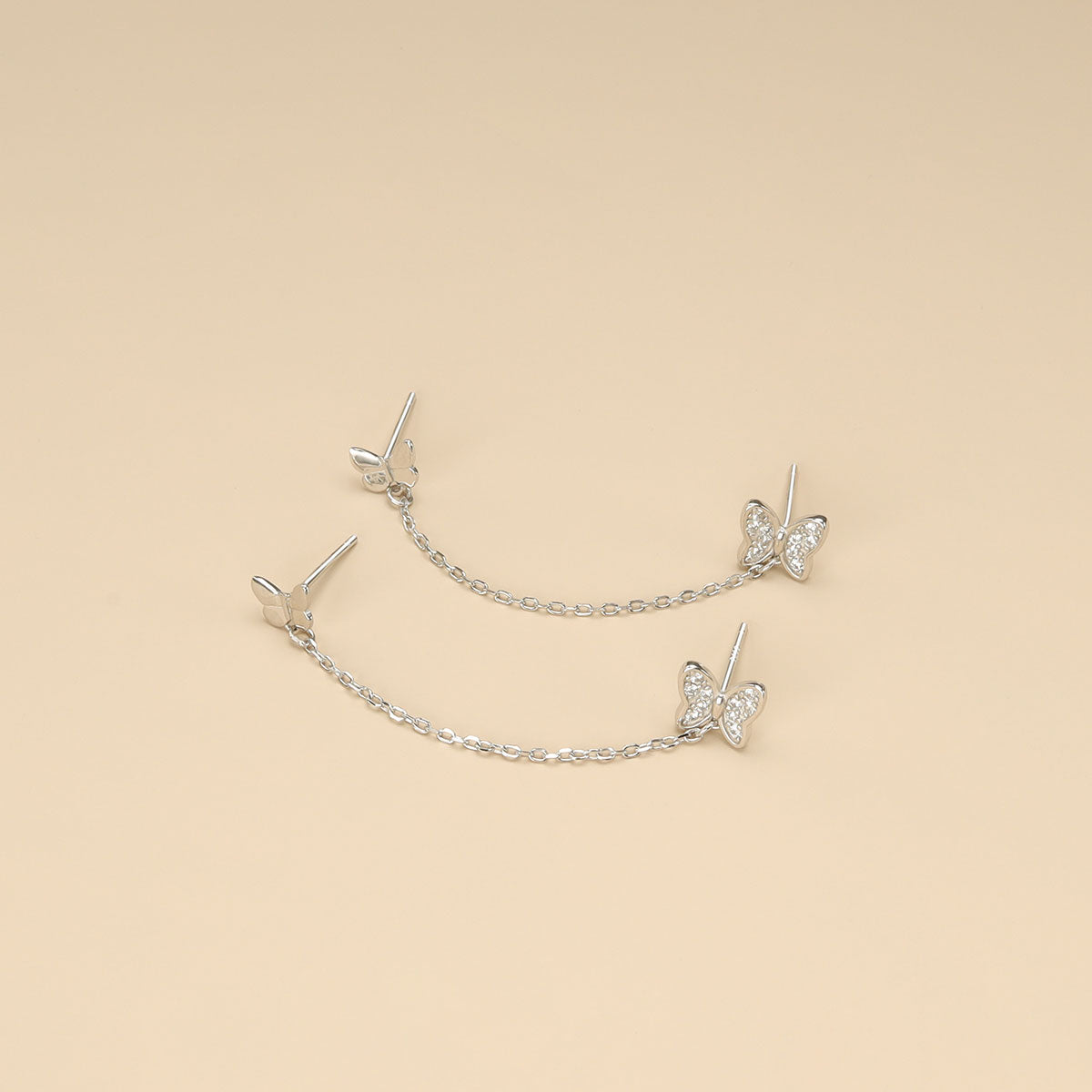 A pair of chain stud earrings.