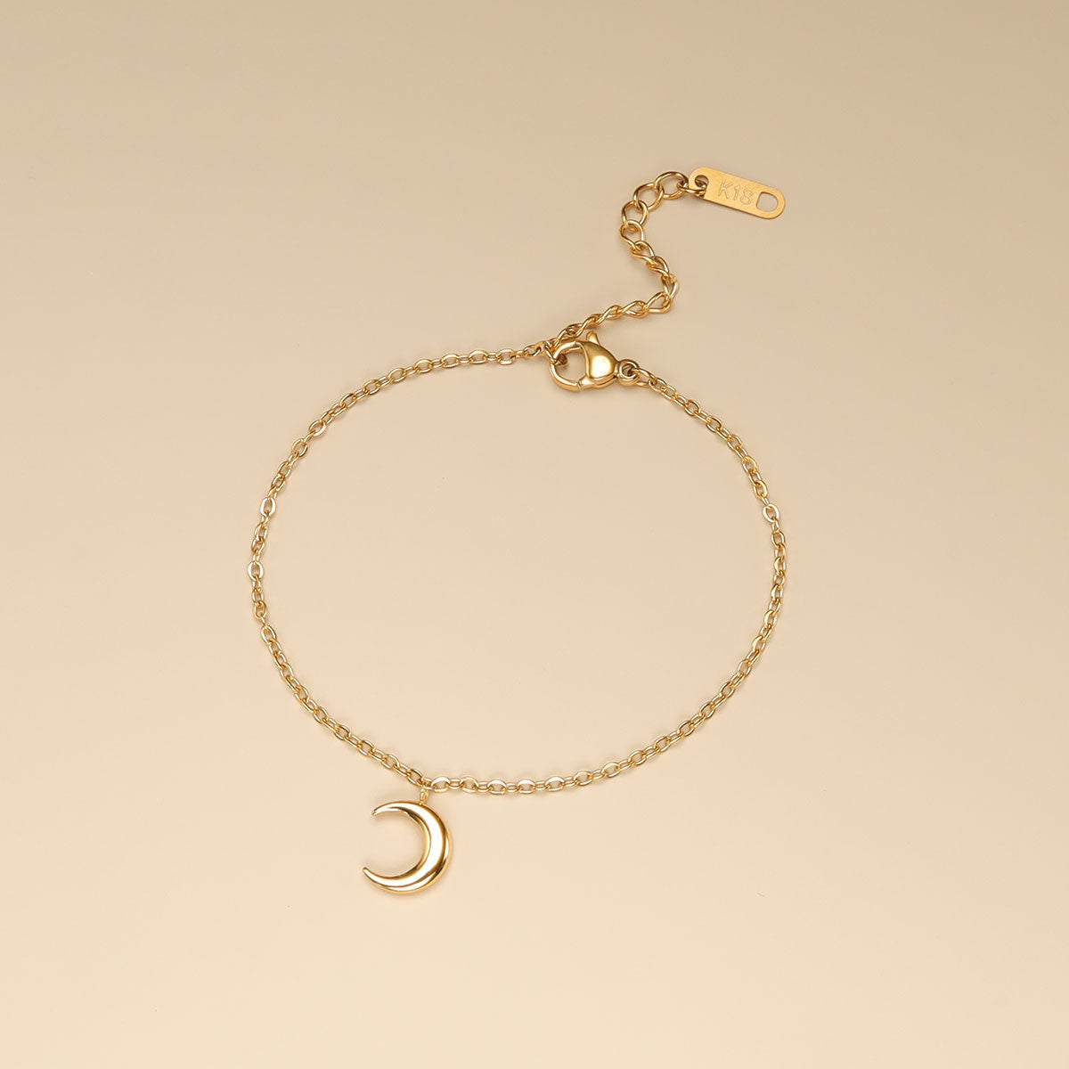 A crescent bracelet with adjustable lobster claw clasp.