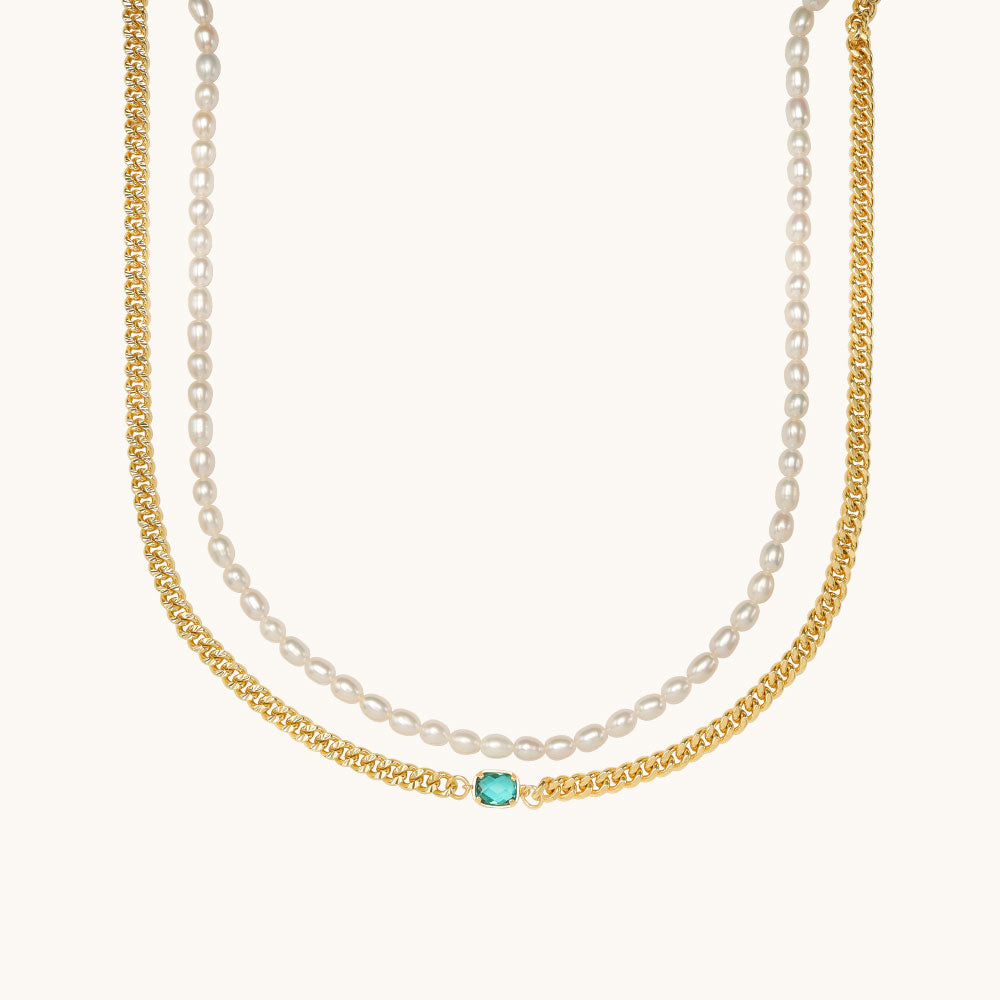 A cuban chain necklace set.