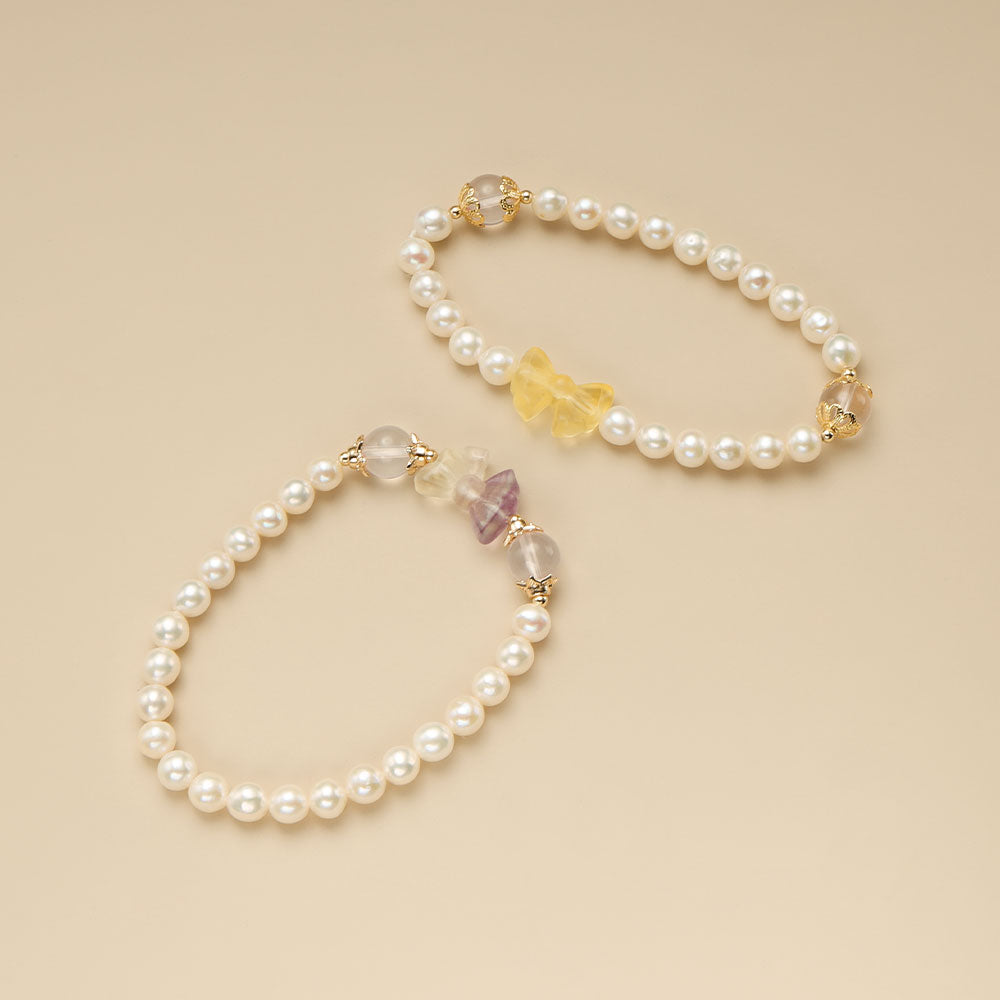 Two cute bracelets with bow.