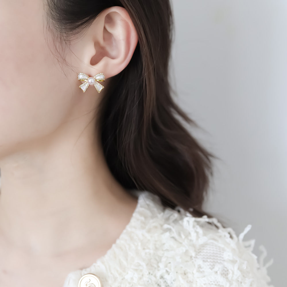 Pearl earrings for girlfriend.