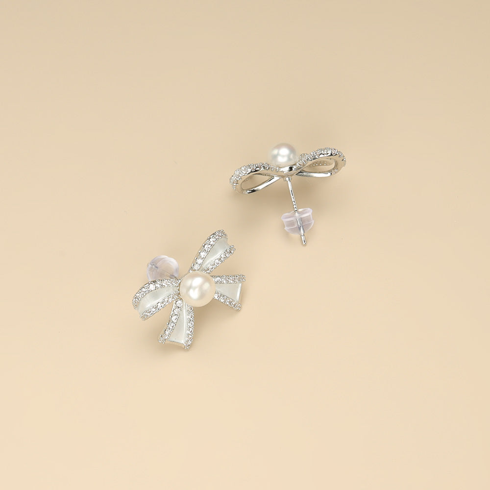 The lateral shot of elegant earrings.