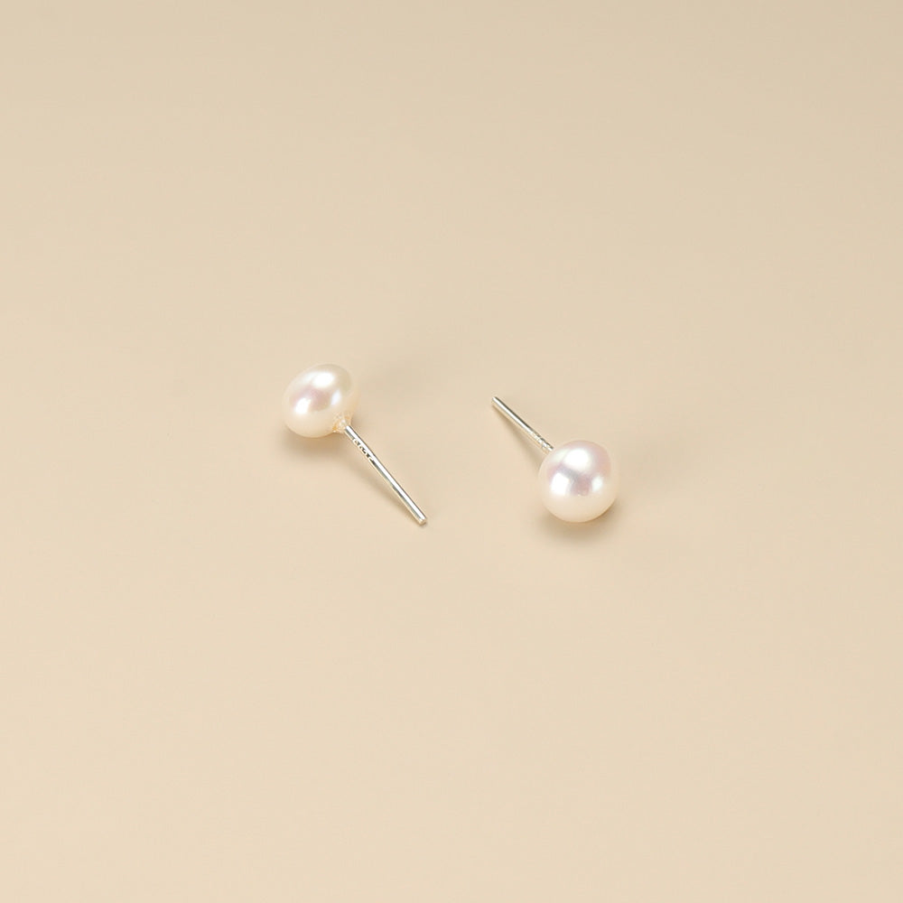 A pair of freshwater pearl earrings.