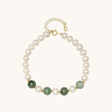 Gold and green pearl bracelet.