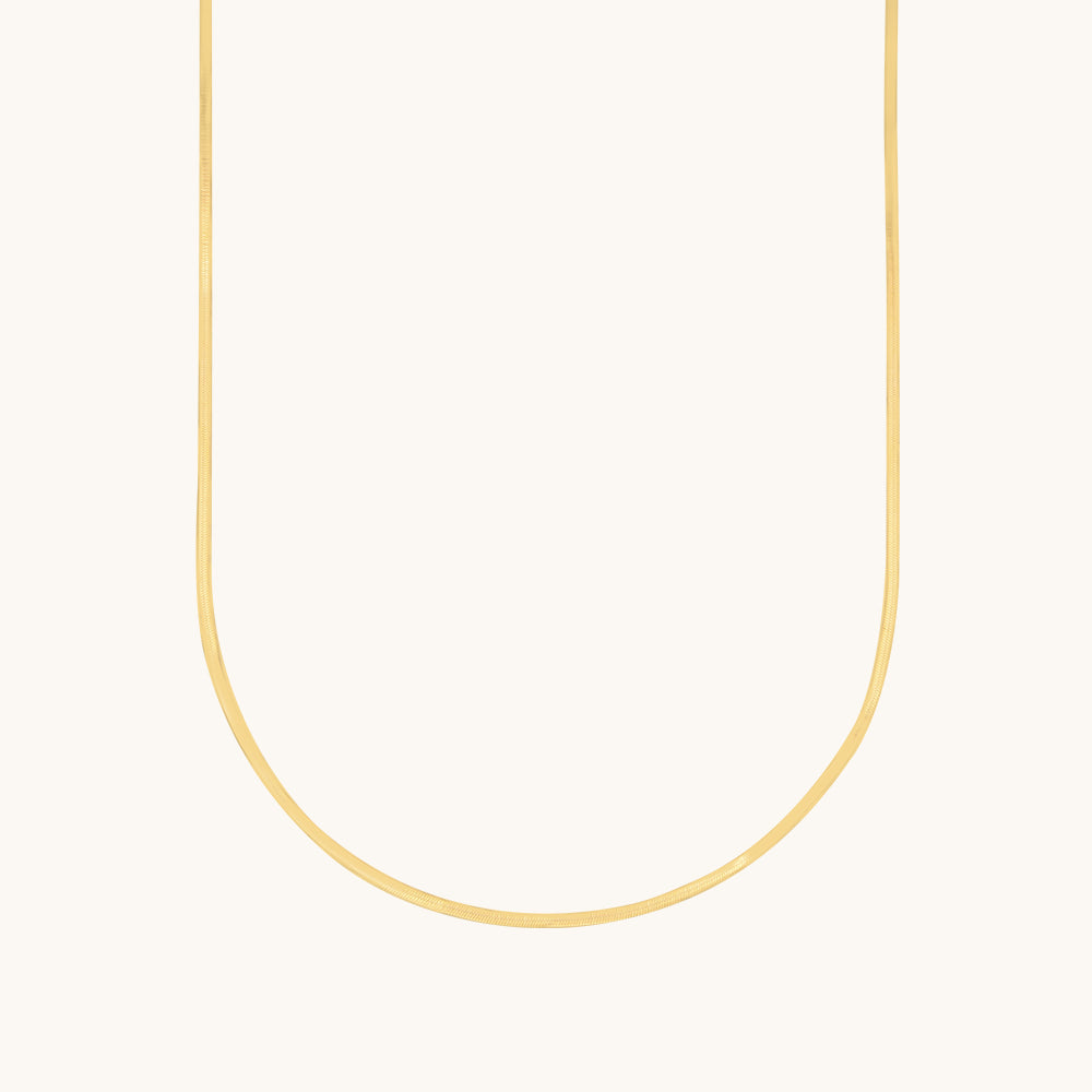 A snake gold chain for women.