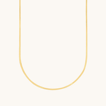 A snake gold chain for women.
