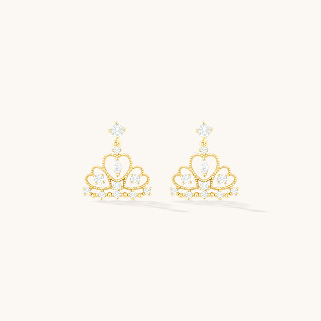 A pair of gold crown dangle earrings.