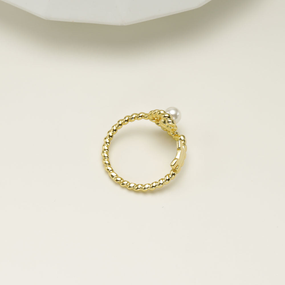 Gold open ring.