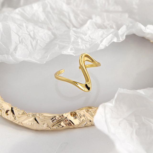 A gold simple rings on stone.