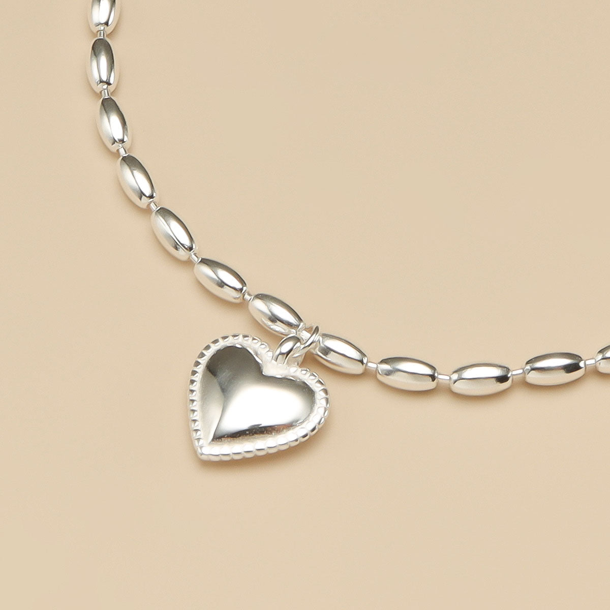 Heart charm bracelet.