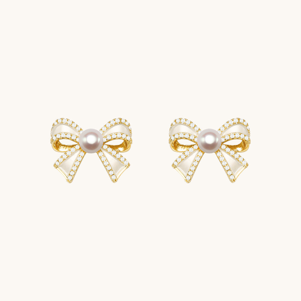 A pair of ladies stud earrings with bow.