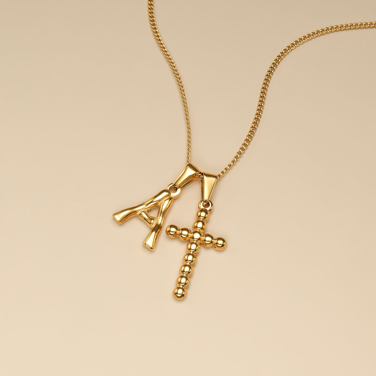 A letter pendant necklace.