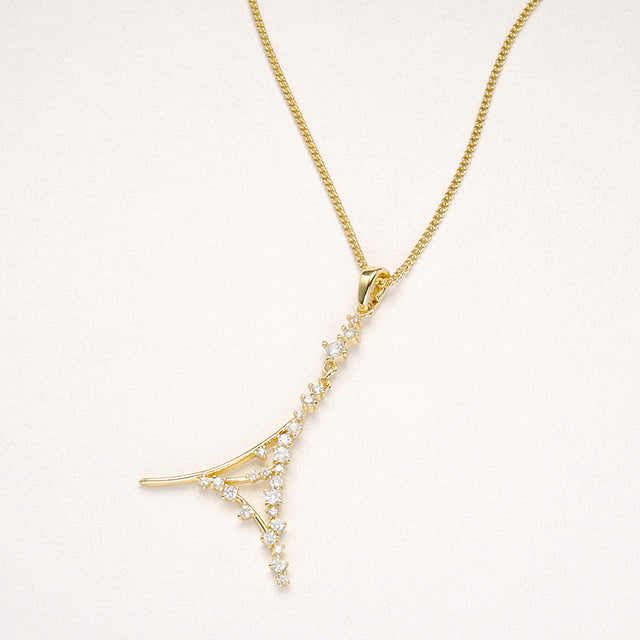 A mom necklace in gold.