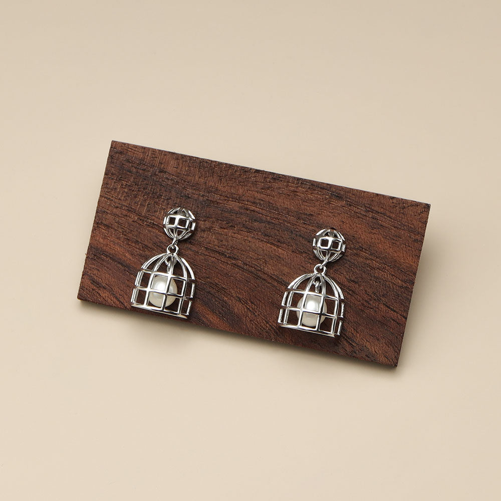 Pearl in cage earrings