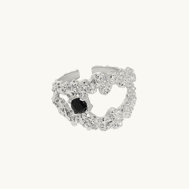 A pretty black stone rings in silver.