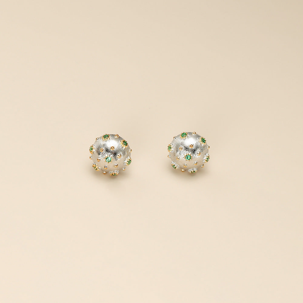 A pair of real silver earrings.