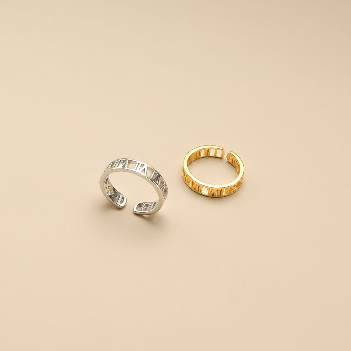 Gold and silver roman numeral class ring.