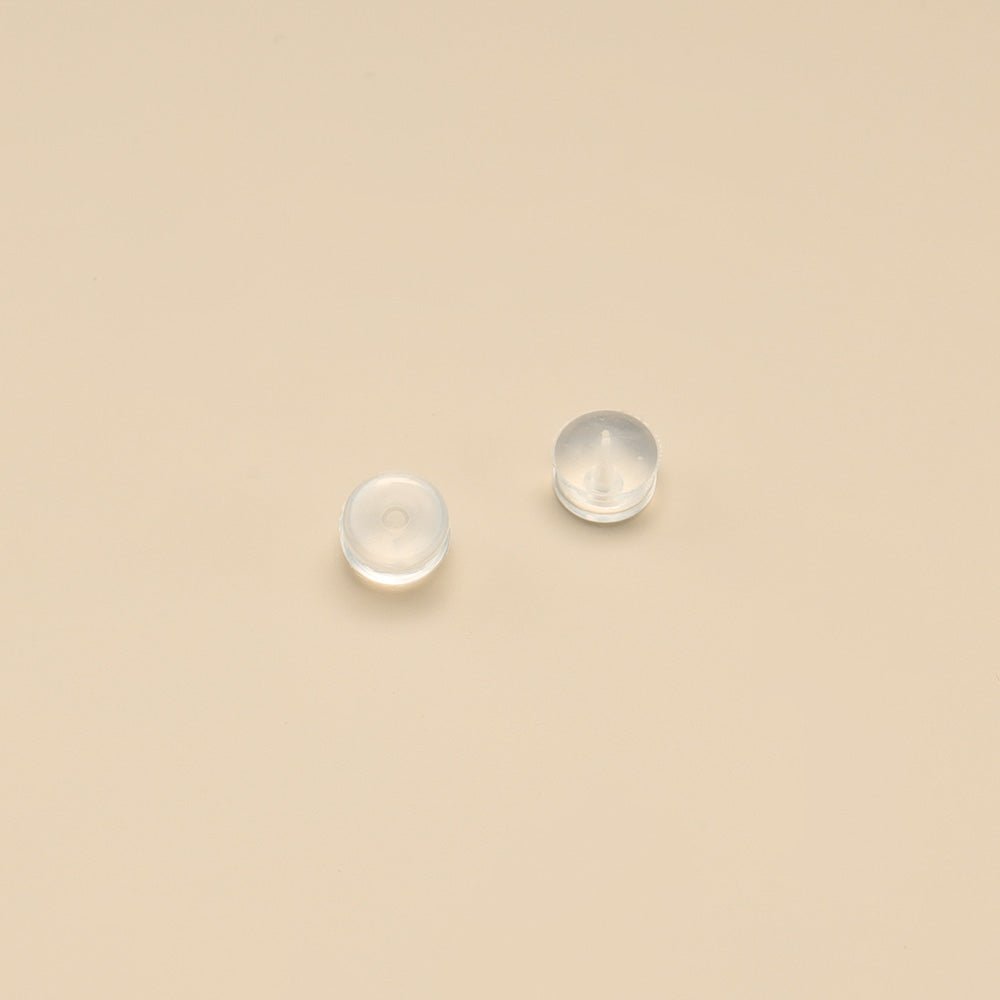 A pair of rubber earring backs.