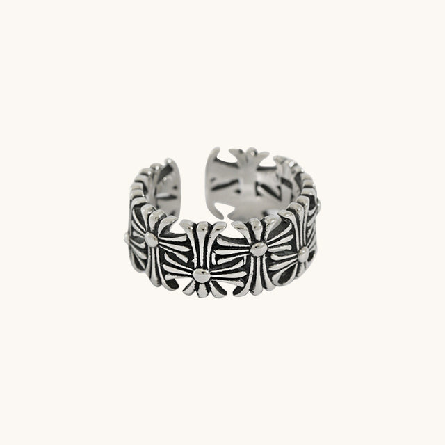 A silver band ring with opening.