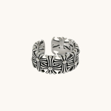 A silver band ring with opening.