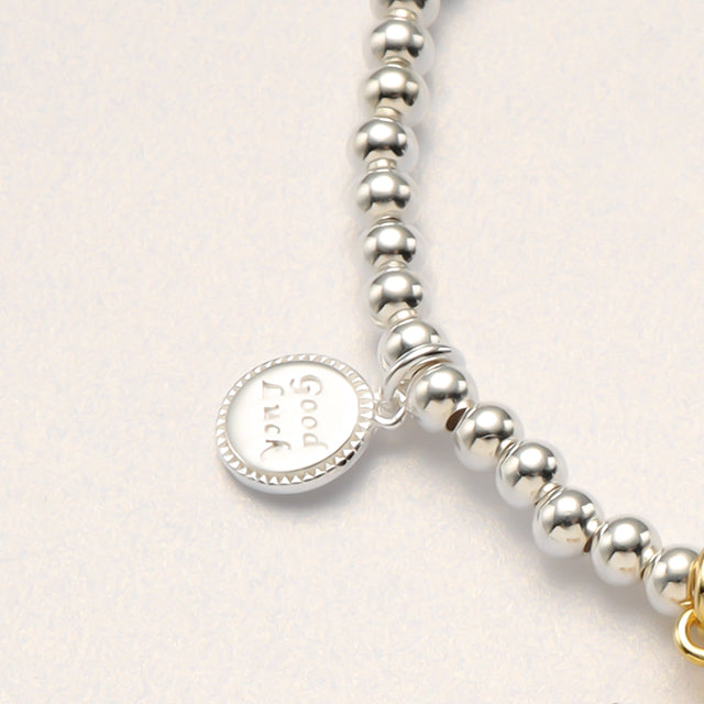 The lucky charm of silver bead bracelet.