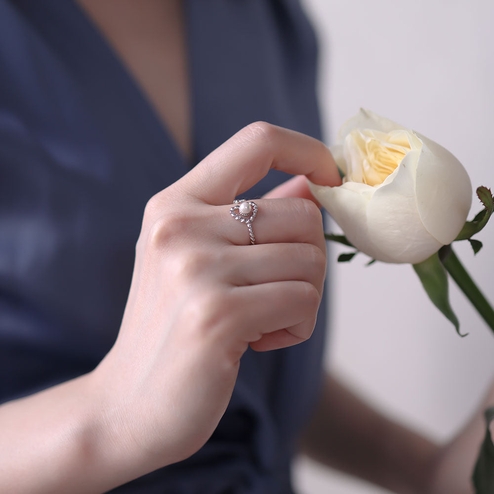 Silver heart ring.