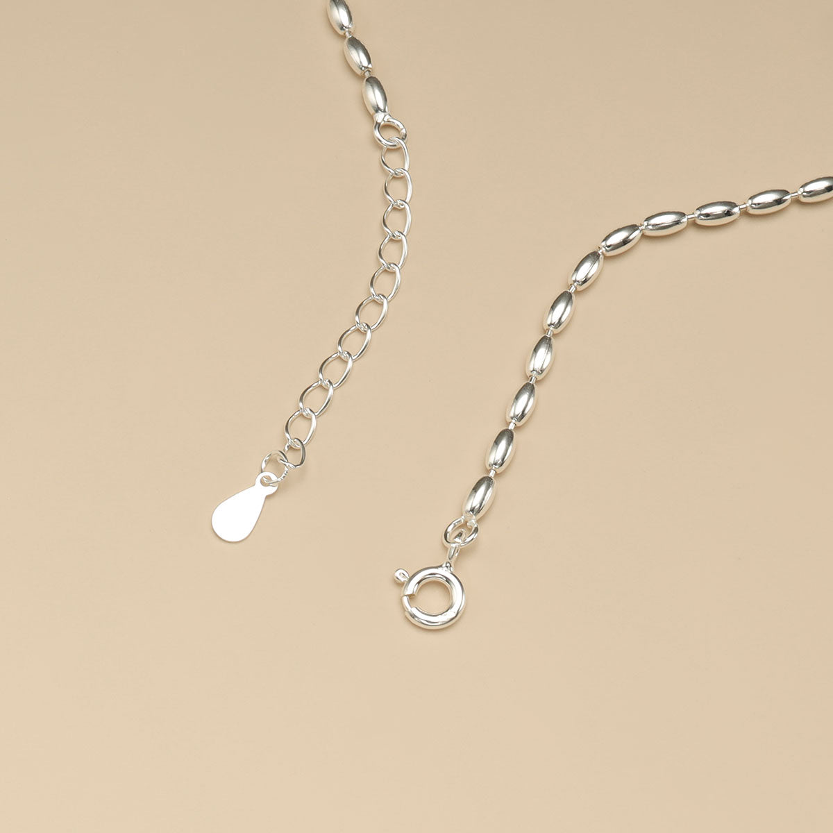 A silver spring ring clasp.