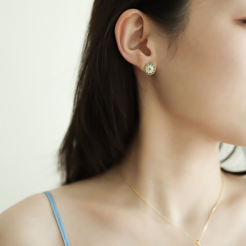 Women wear solid silver earrings.