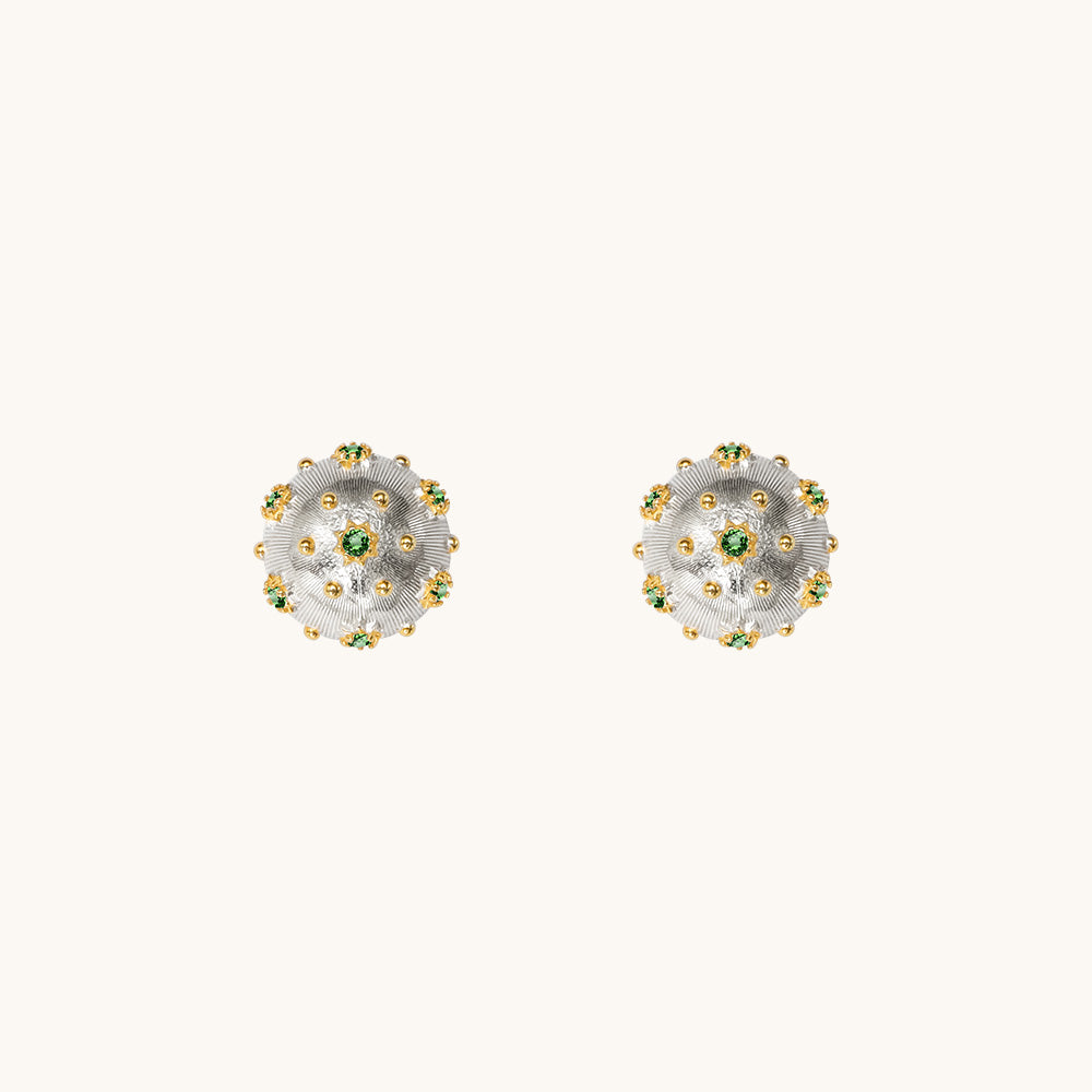 A pair of sterling silver studs.