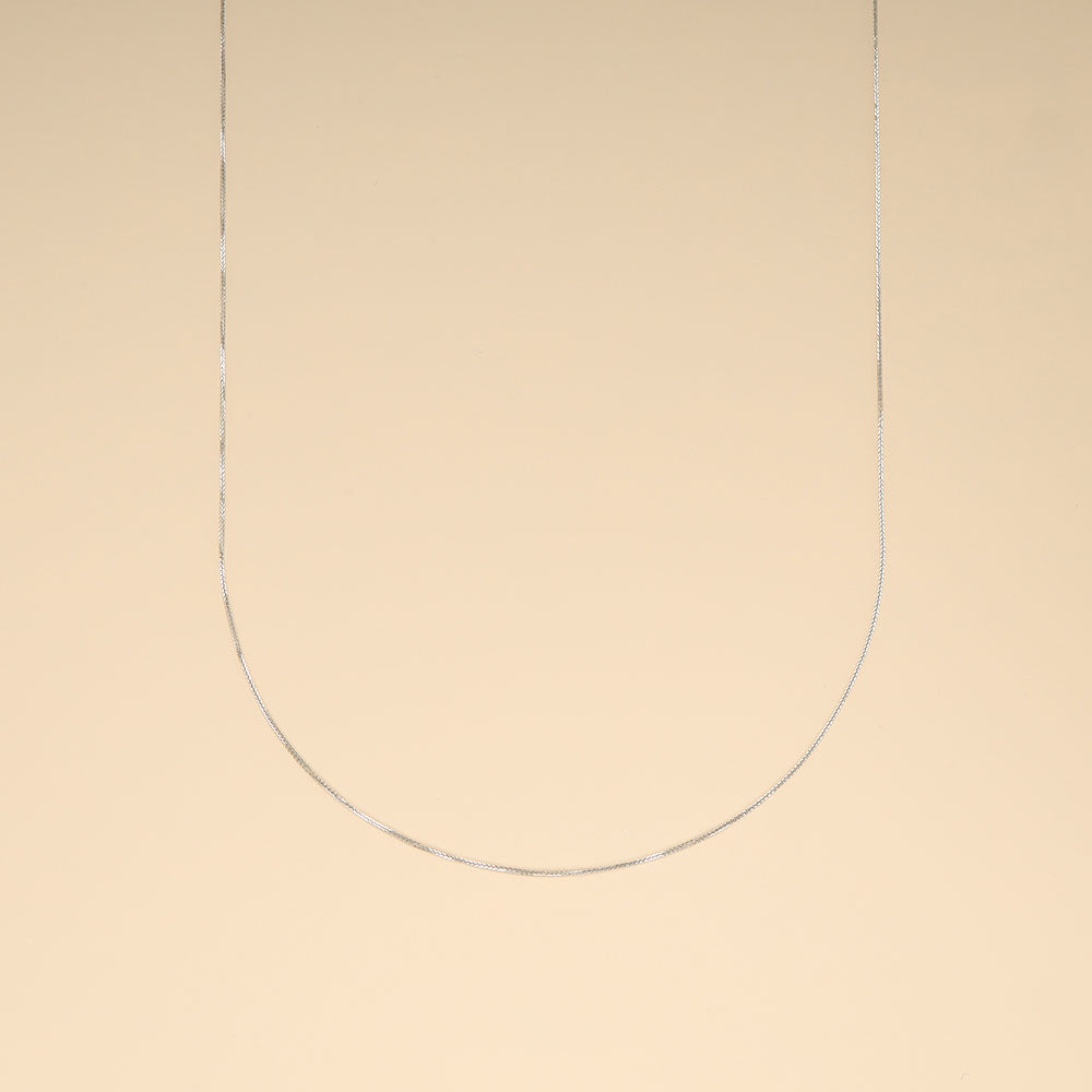 A white gold necklace chain.